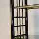 Vintage 1970s shelf in smoked glass with a bamboo-style structure.