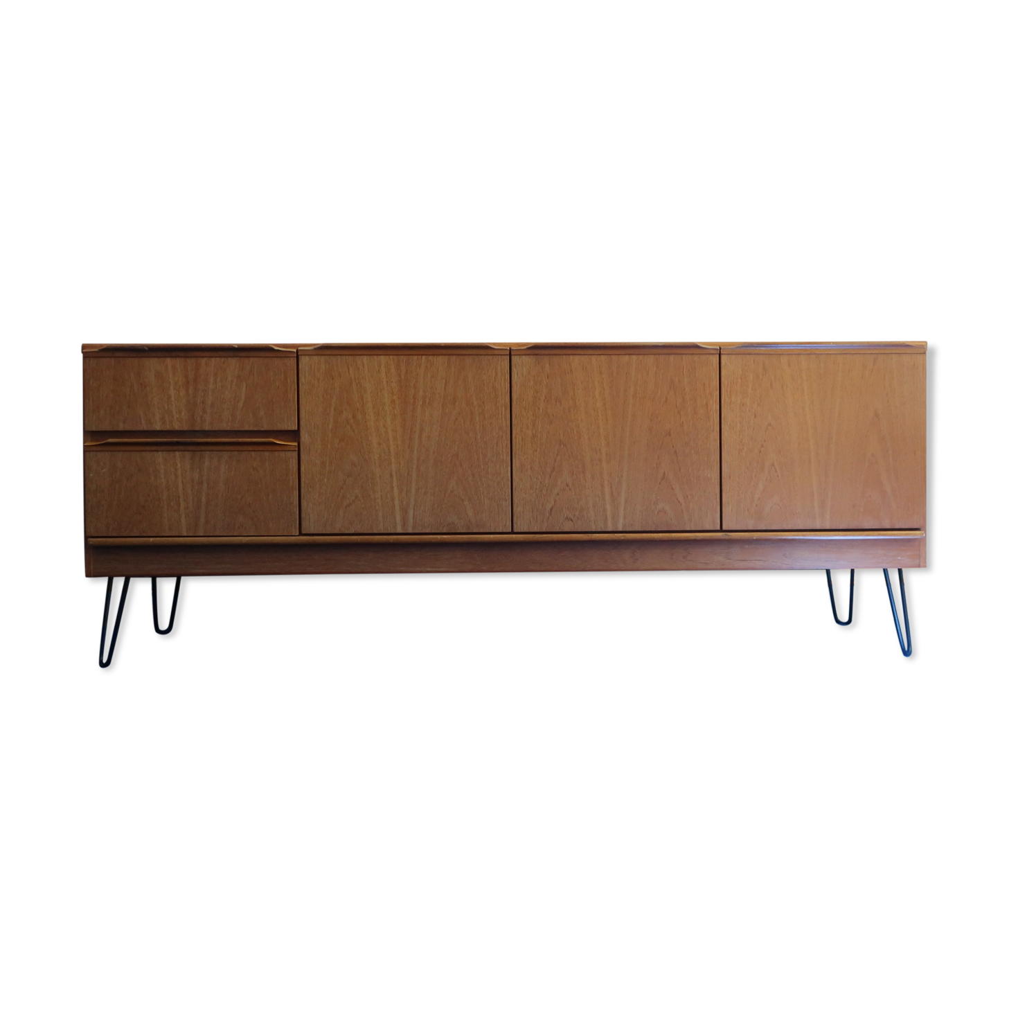 Teak sideboard from the 60s/70s pins