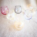 Small glasses with multicolored feet