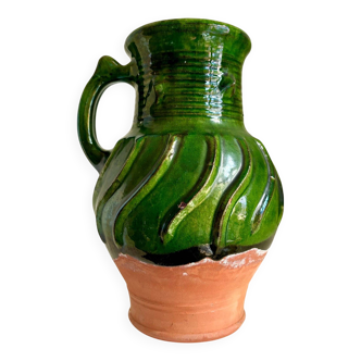 Green glazed terracotta pitcher