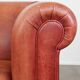 English Chesterfield club chair in light red cowhide leather