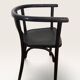 Curved black lacquered wooden armchair in Thonet style