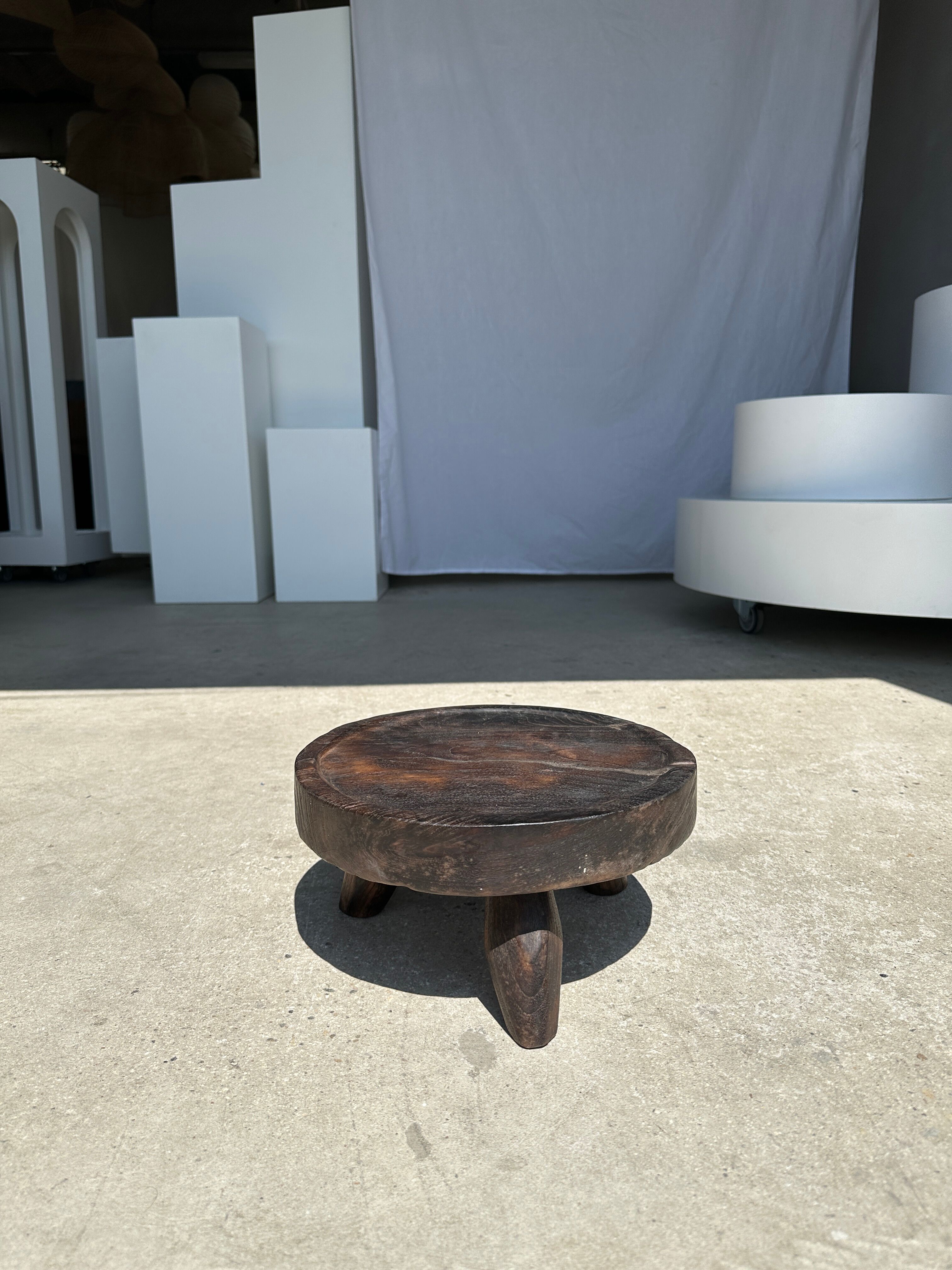 Small tripod stool low in dark brown upcycled teak