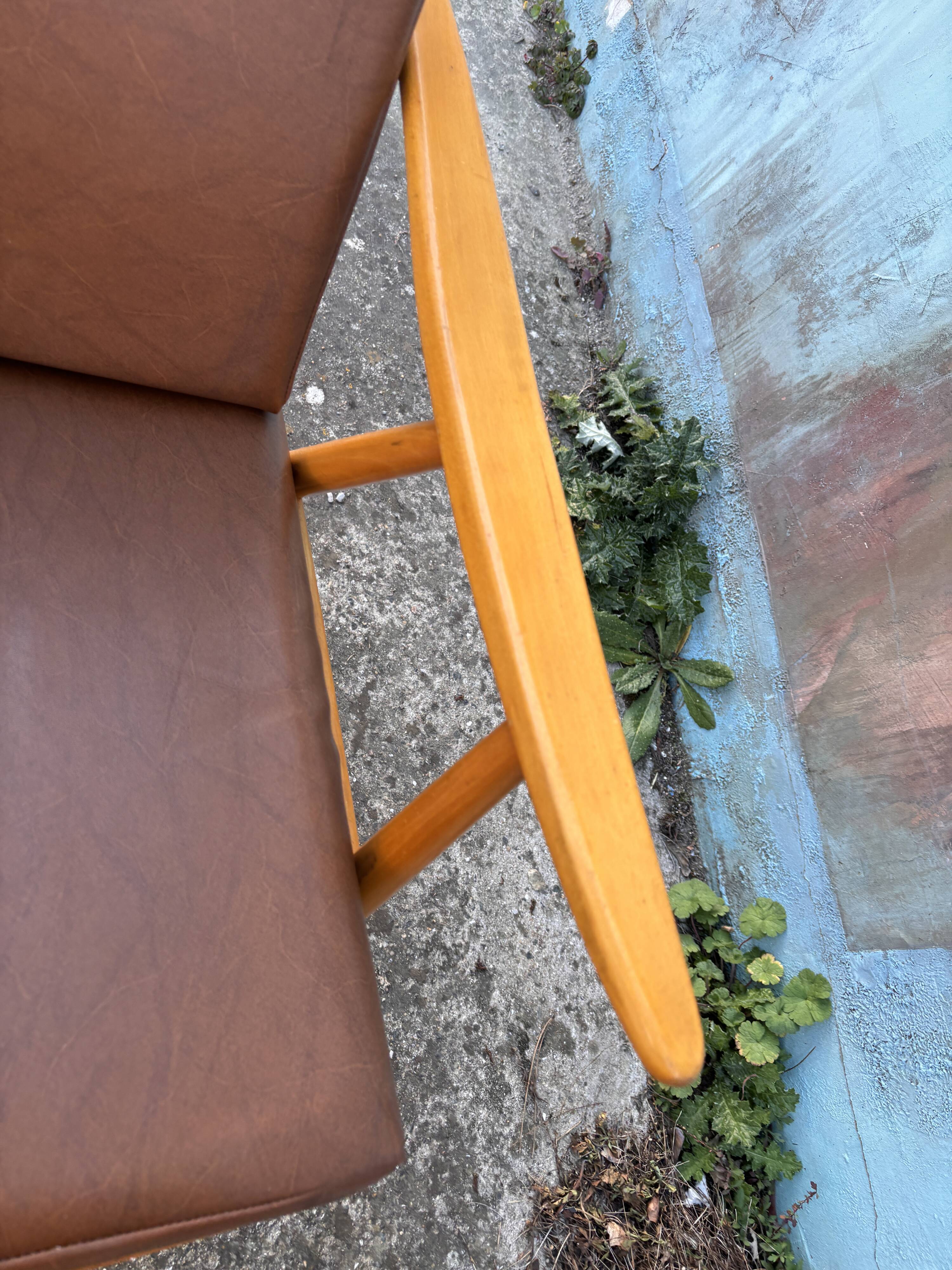 Pair of vintage armchairs with compass legs, "Boomerang" model by THO editions.