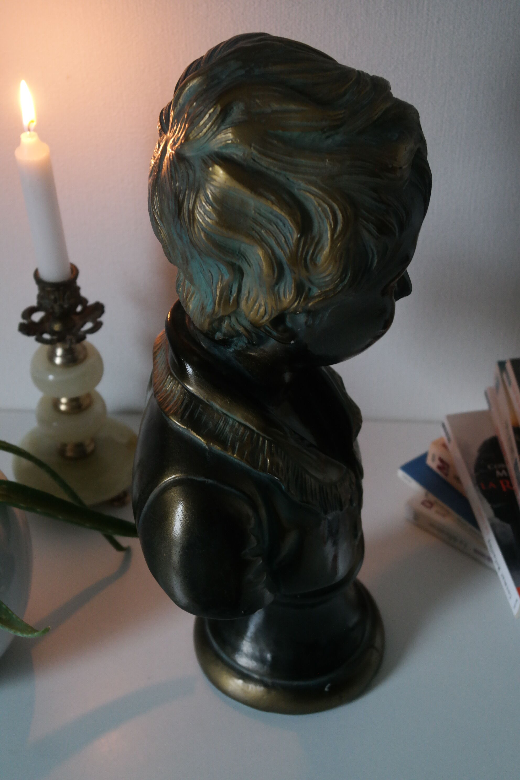 Buste en plâtre garçon patine bronze XXème