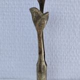 Bronze sculpture with leaf decoration