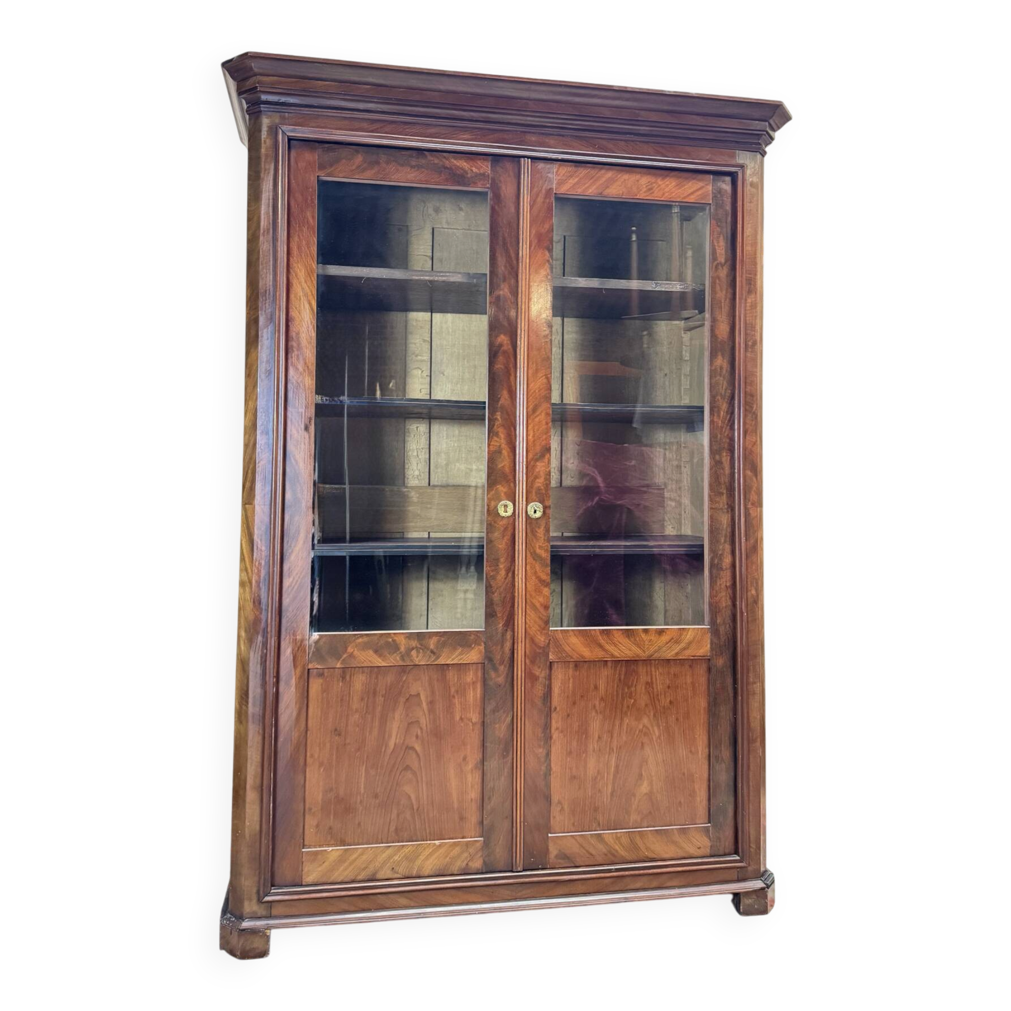Bibliothèque en acajou flammé d’époque restauration xix eme siècle