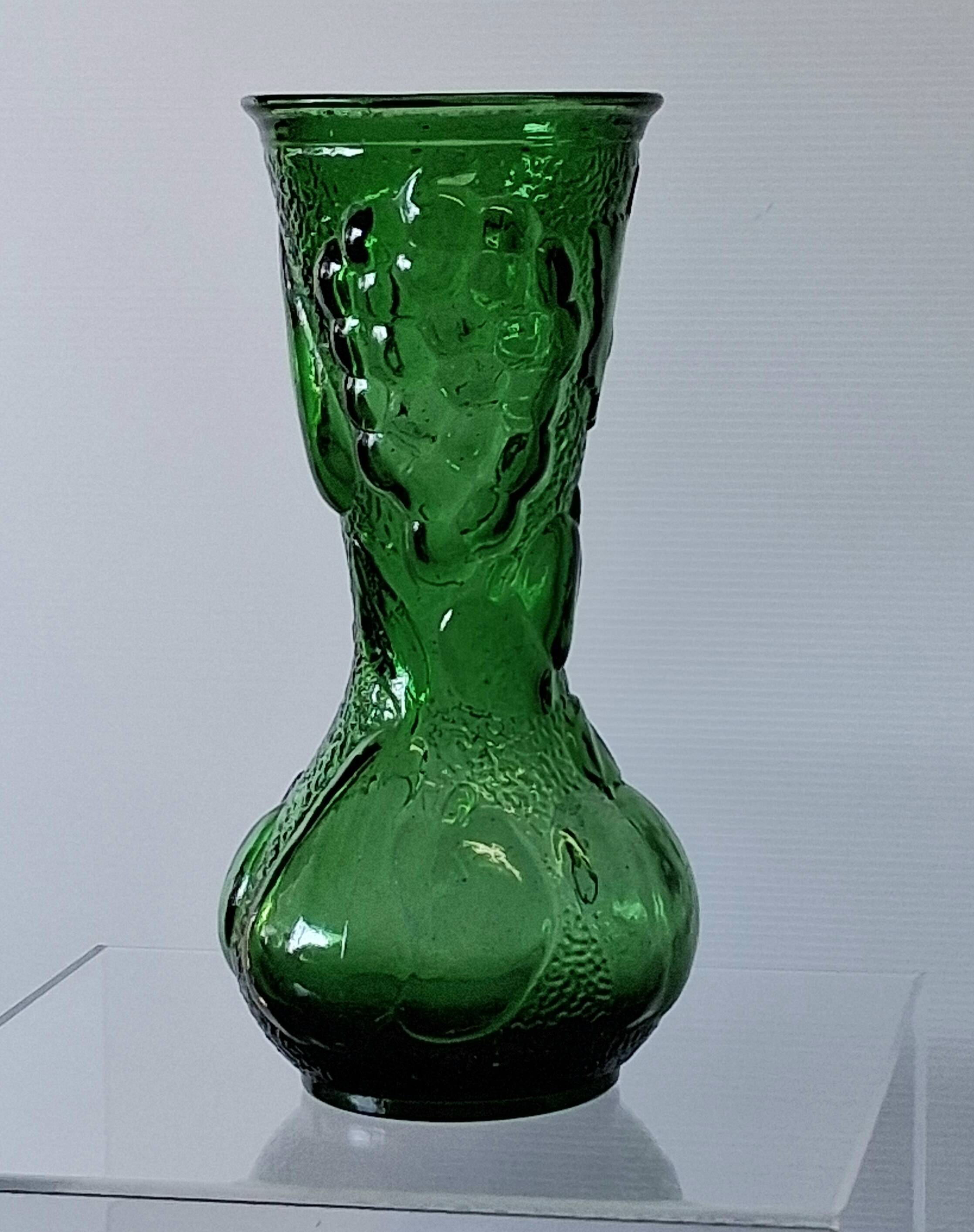 Vintage green glass vase with a fruit design in very good condition.