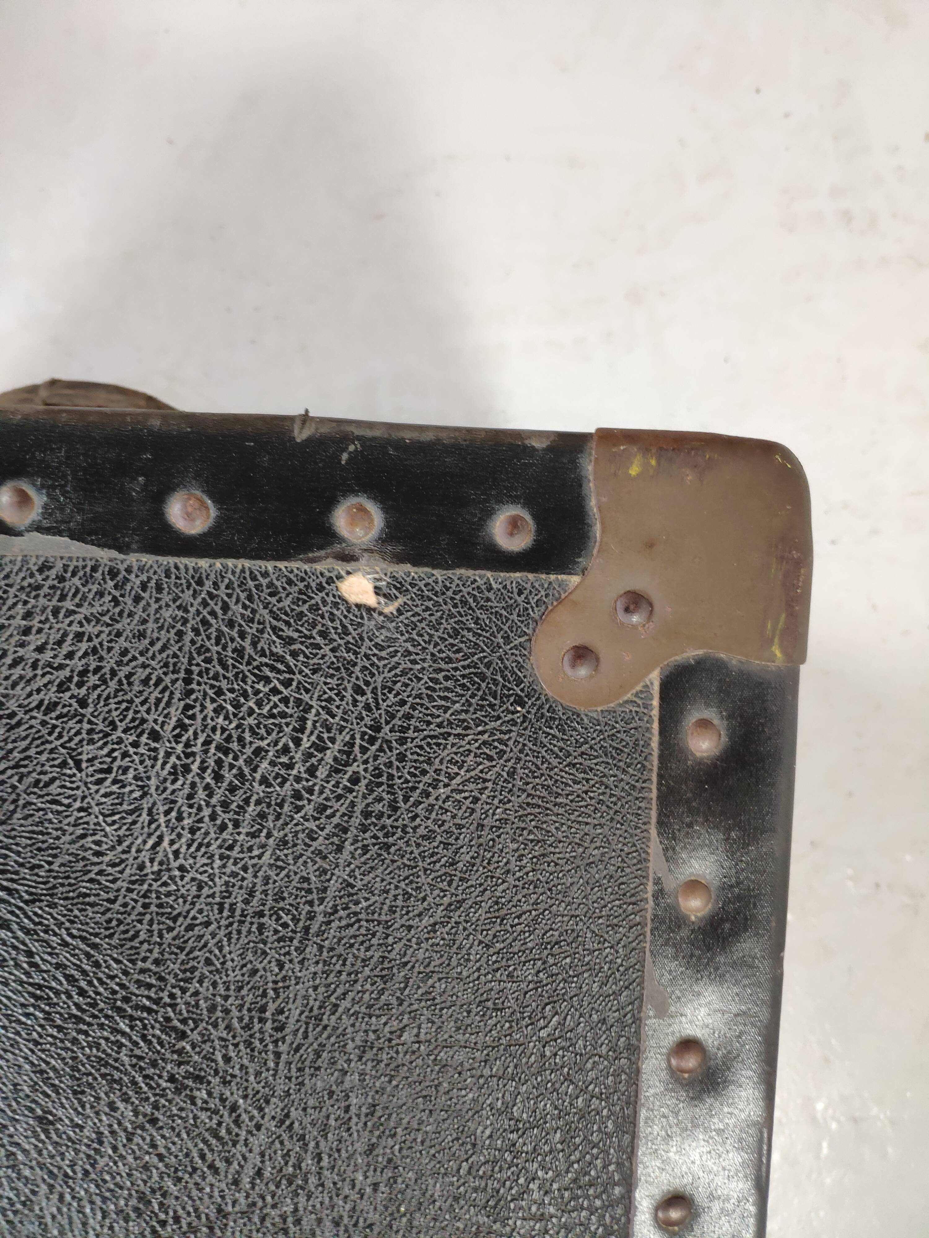 Old black trunk and brass