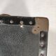 Old black trunk and brass
