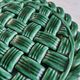Woven green ceramic trivet in Vallauris style
