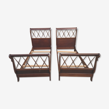 Pair of twin swan collar empire-style beds in mahogany XXth