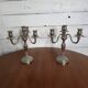 Pair of Louis XVI style candlesticks in silver-plated bronze