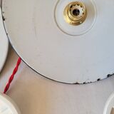 Trio of enameled sheet metal pendant lights