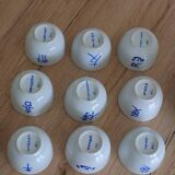 Teapot set and 9 cups with Chinese and French words