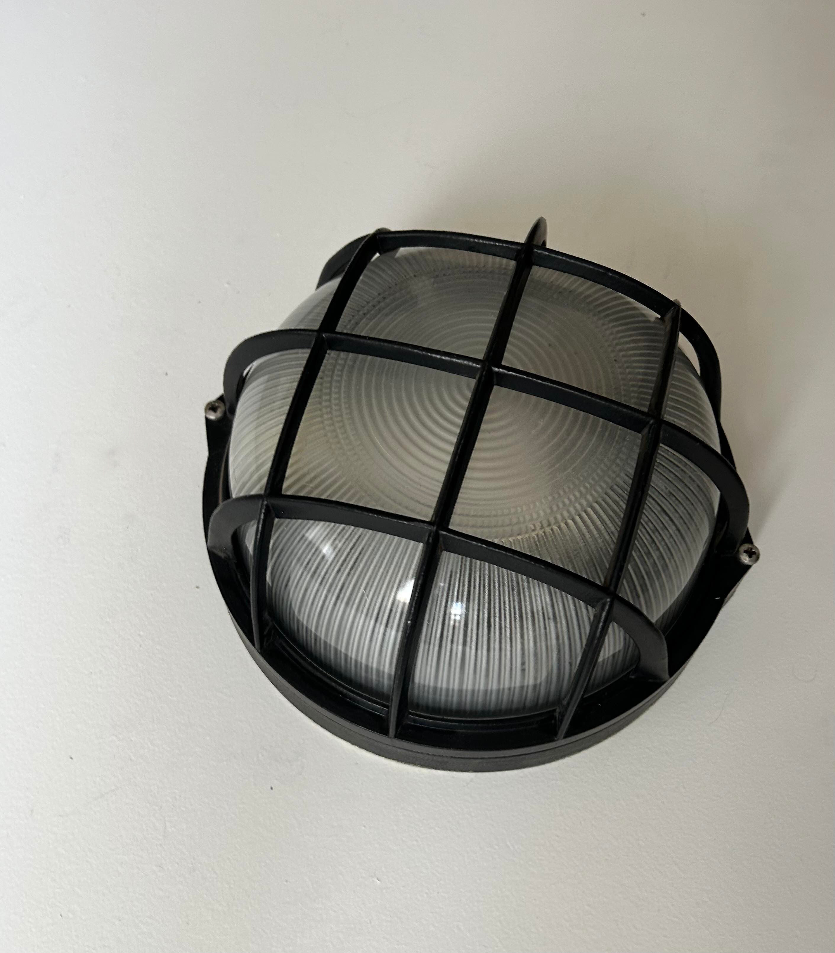 Vintage wall lamp, black metal and ridged glass, France 1980.