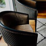 Pair of Art Deco barrel chairs in black and bronze