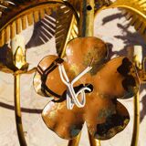 Golden palm leaf sconce