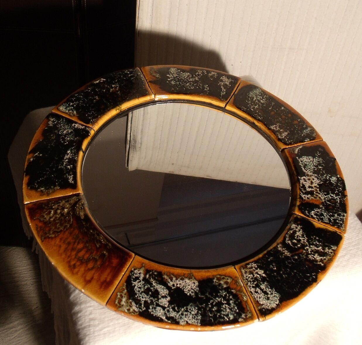 Old vintage round ceramic mirror