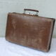 Suitcase for child in brown cardboard
