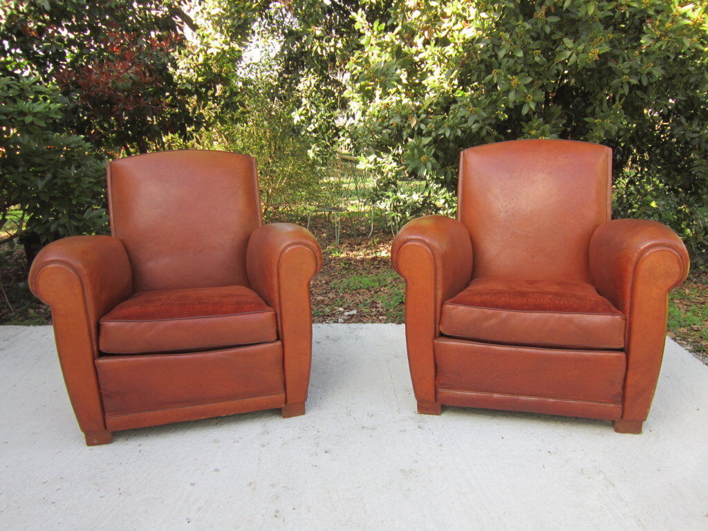 Paire de fauteuils club en cuir