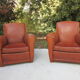 Paire de fauteuils club en cuir