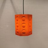 Danish Space-Age hanging lamp from the 80s, made in orange metal with cut-outs.