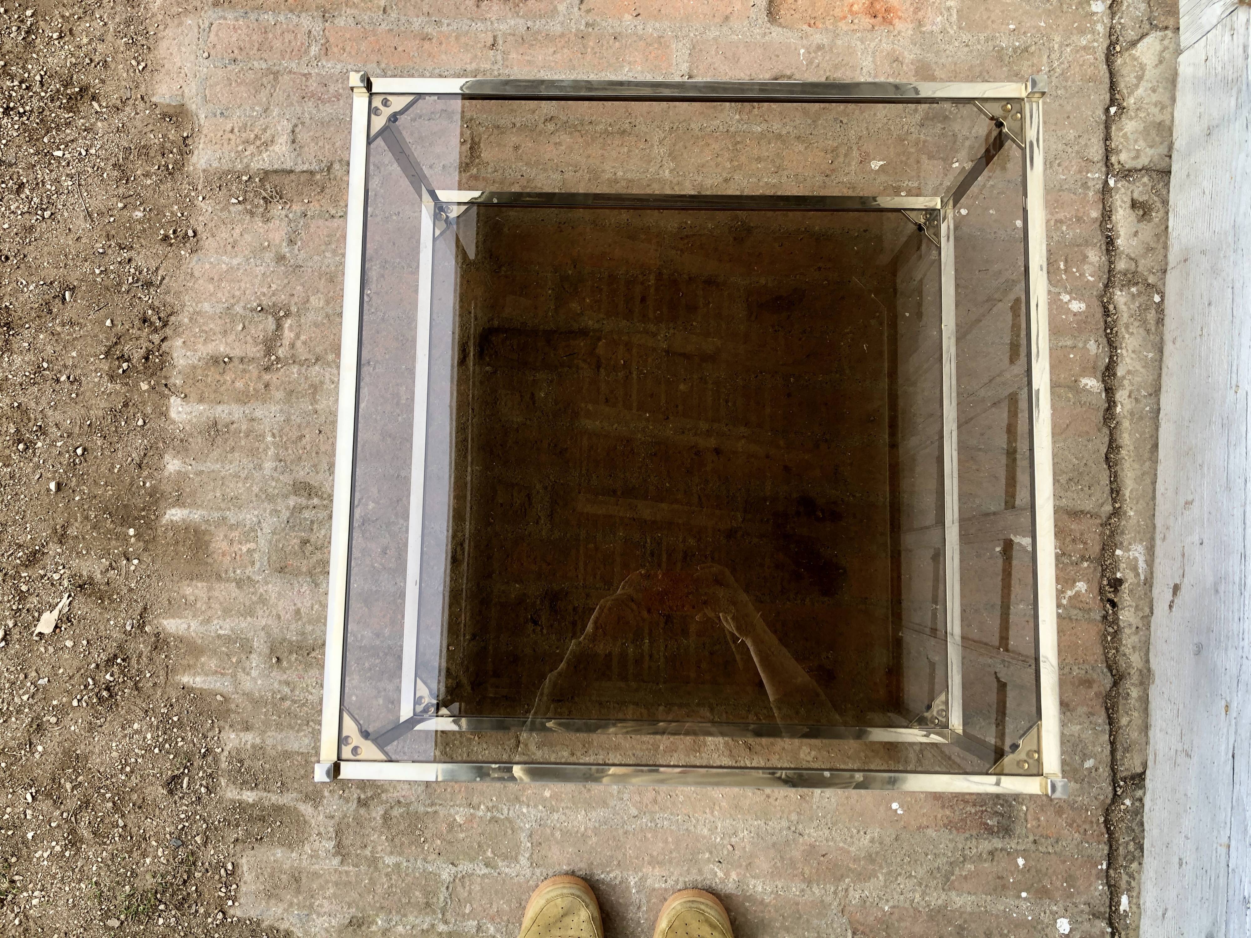 Square brass coffee table and smoked glasses