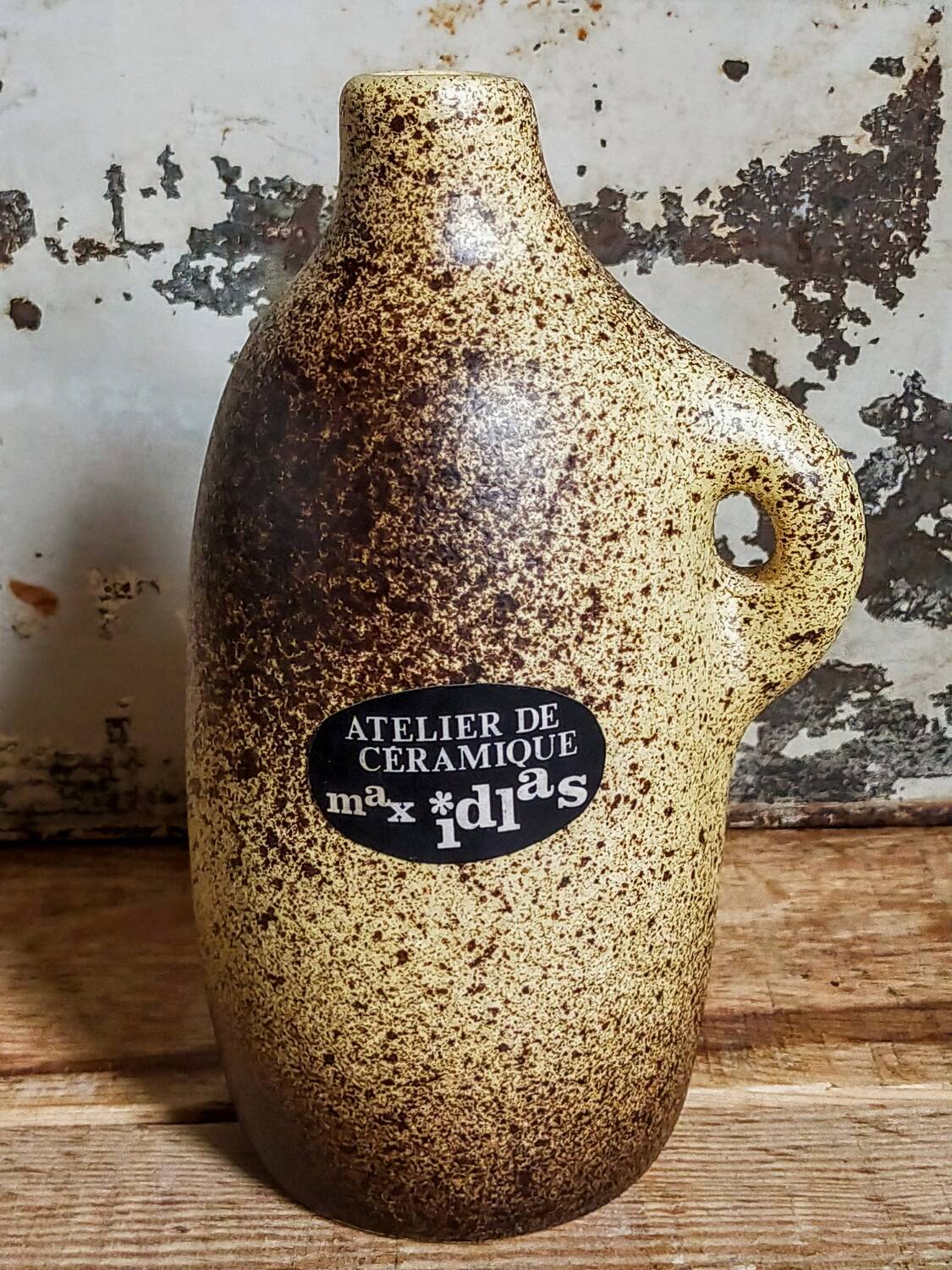 Single-flower vase, ceramic bottle by Max Idlas