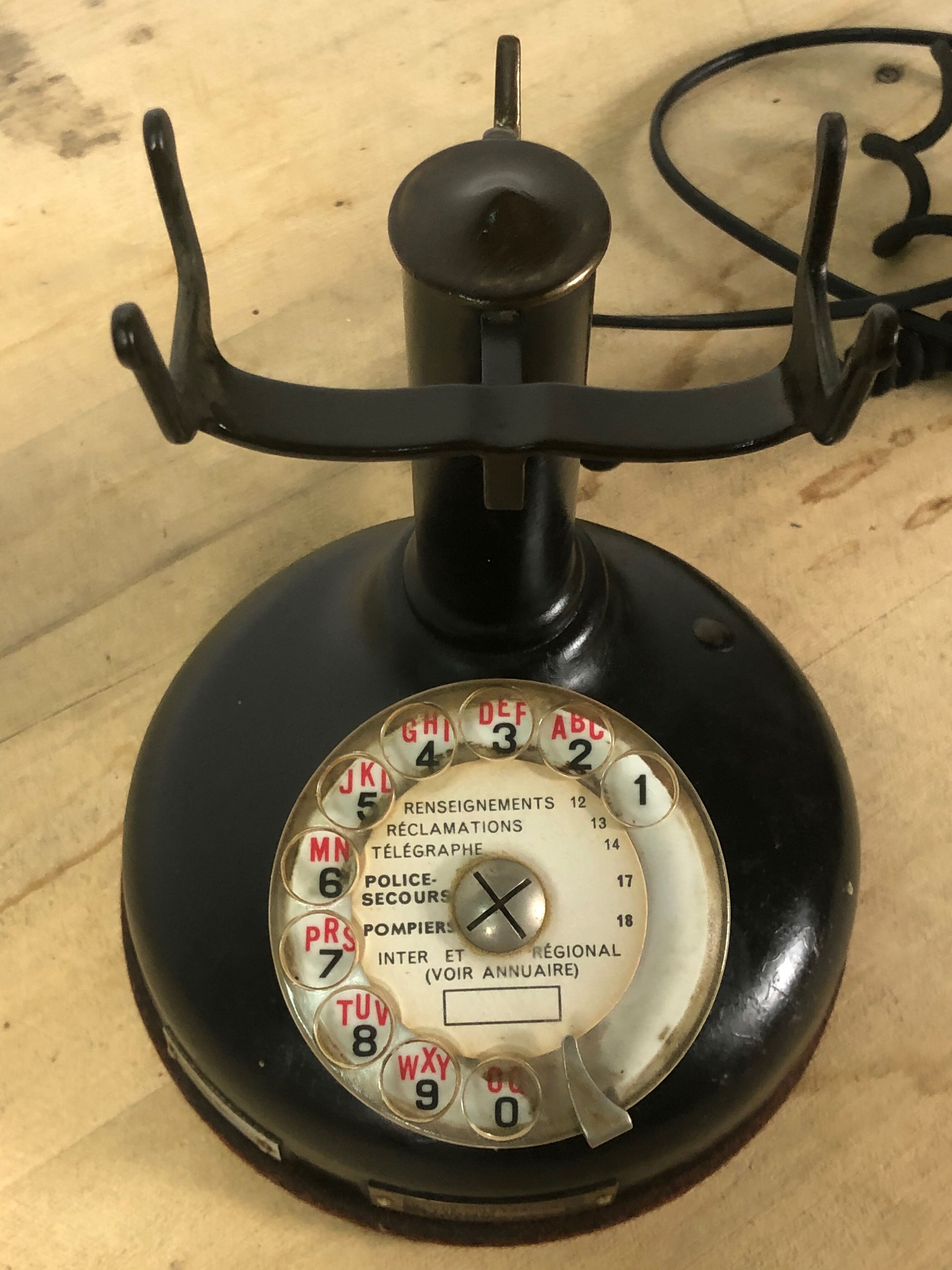 Old column phone in Bakelite and metal 1936