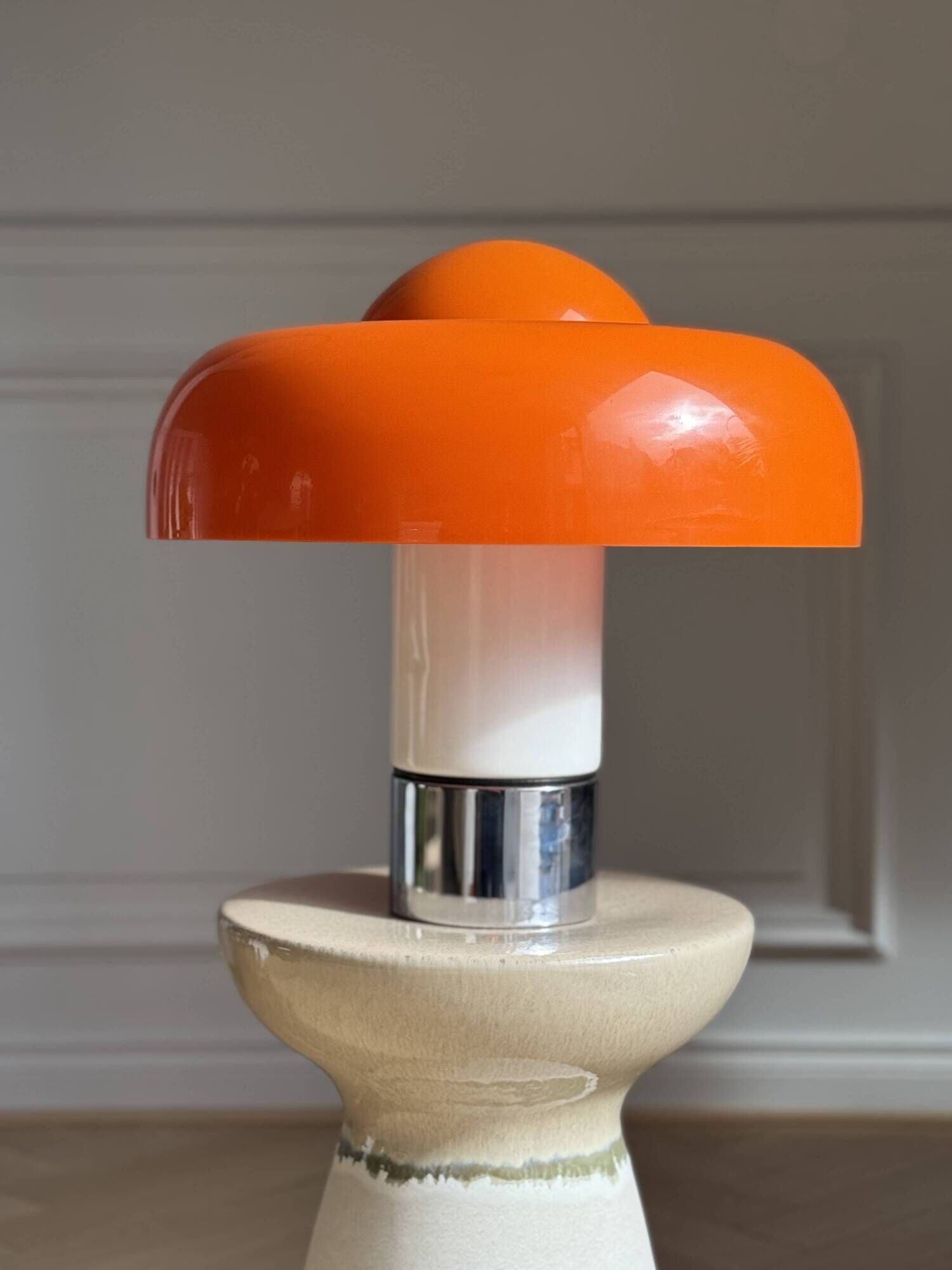 Brumbury lamp by Guzzini, designed by Luigi Massoni.
