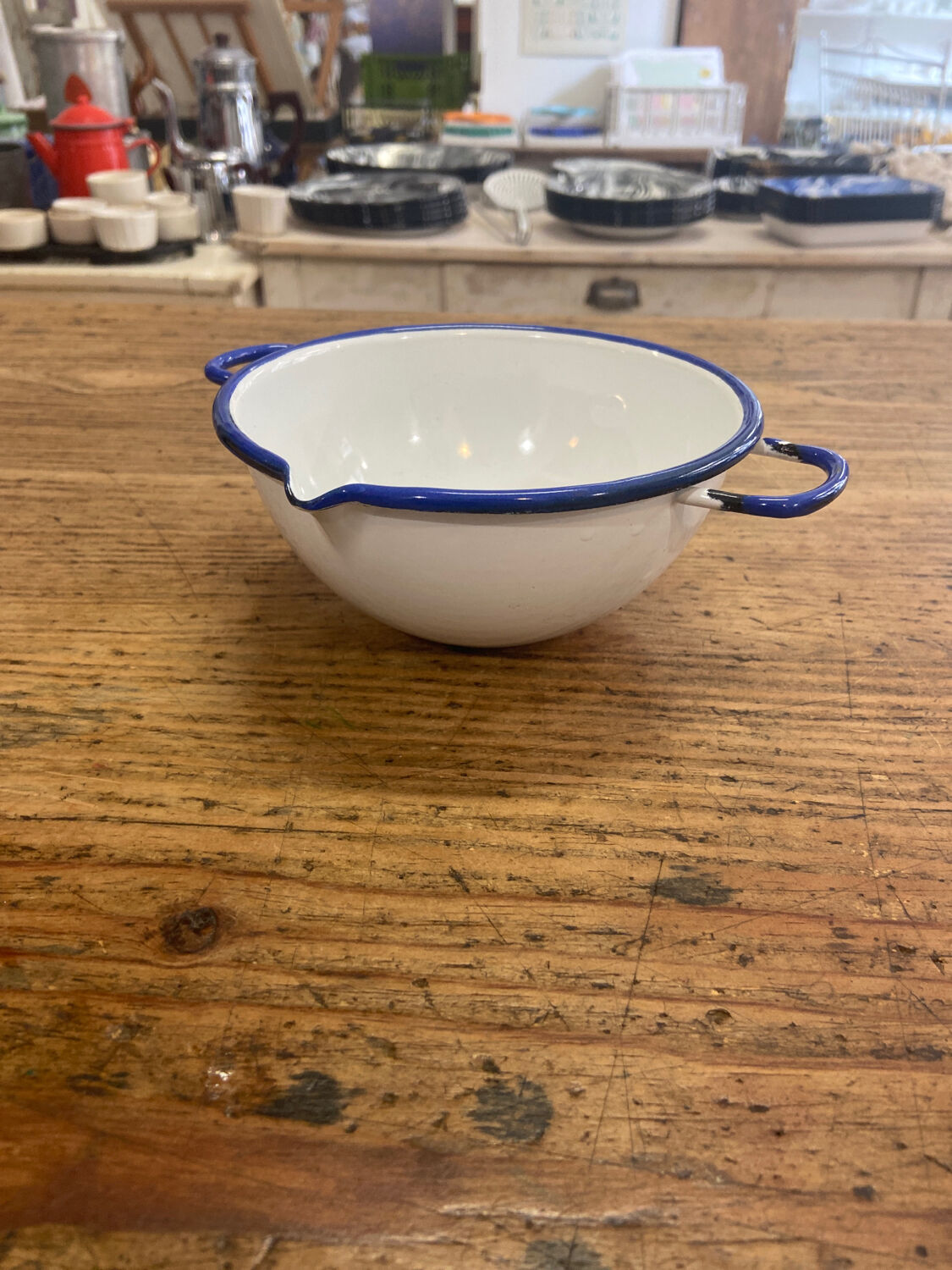 White enamel bowl and blue border