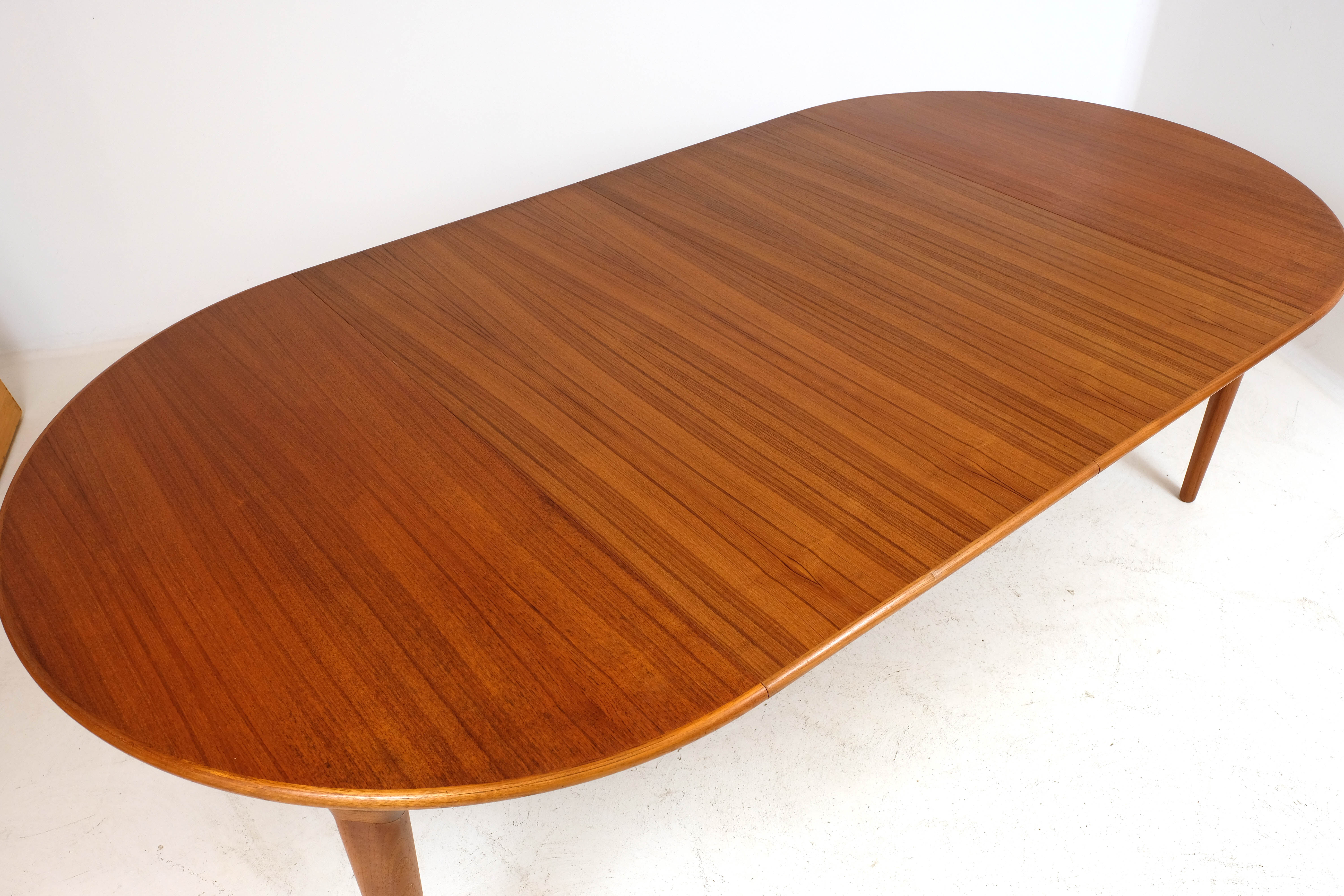 Teak extension table by J. Andersen for Uldum 1960