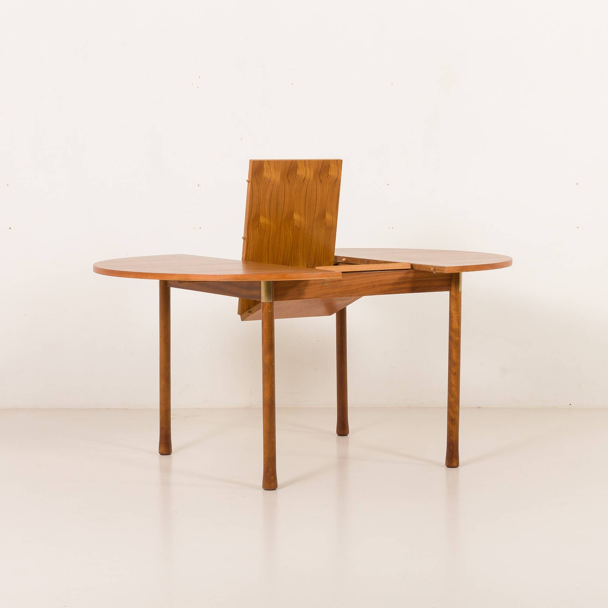 Italian mid-century round extension teak table with brass details, 1960s