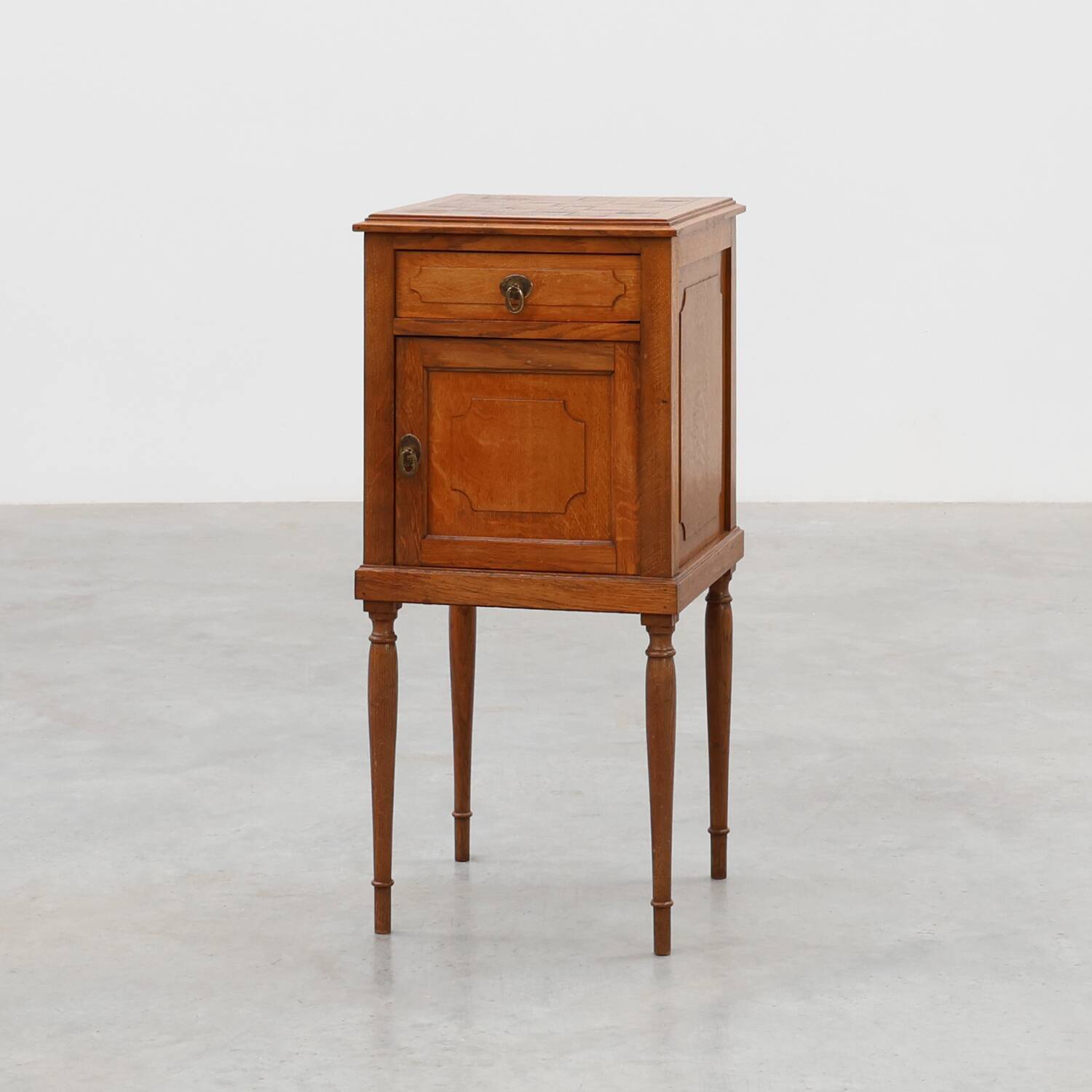 Art Deco nightstand in oak with turned legs, France 1920