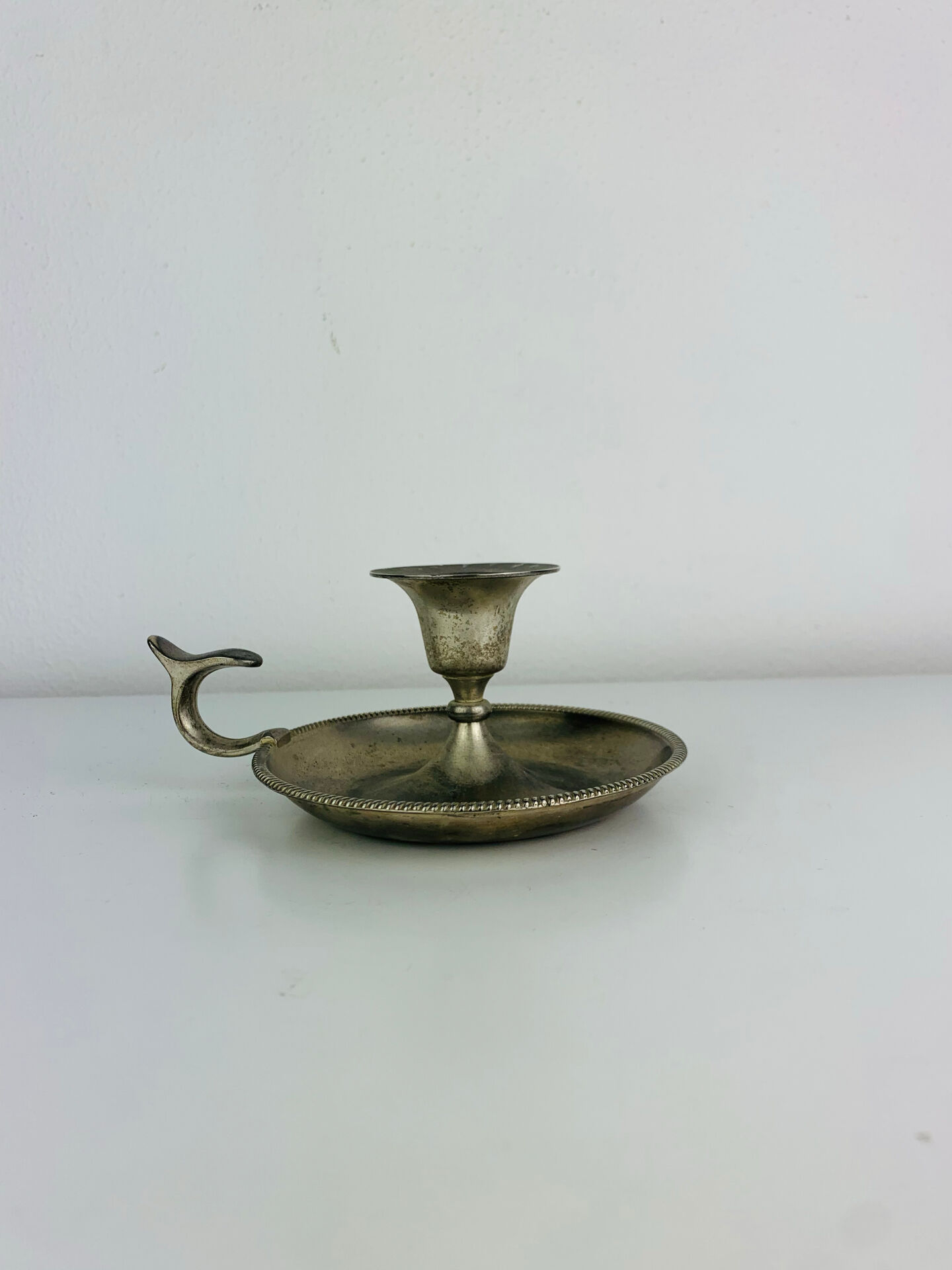 Silver-plated metal candlestick, vintage rat.
