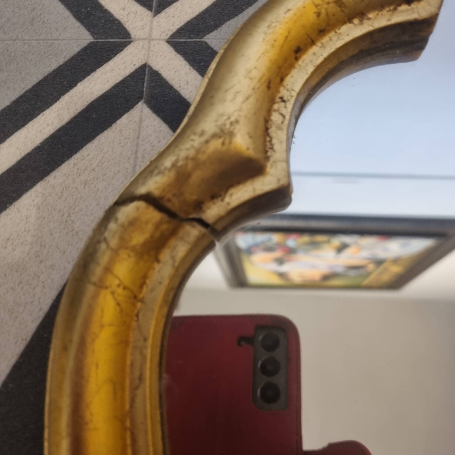 Batoque mirror in gilded wood 65 x 42 cm
