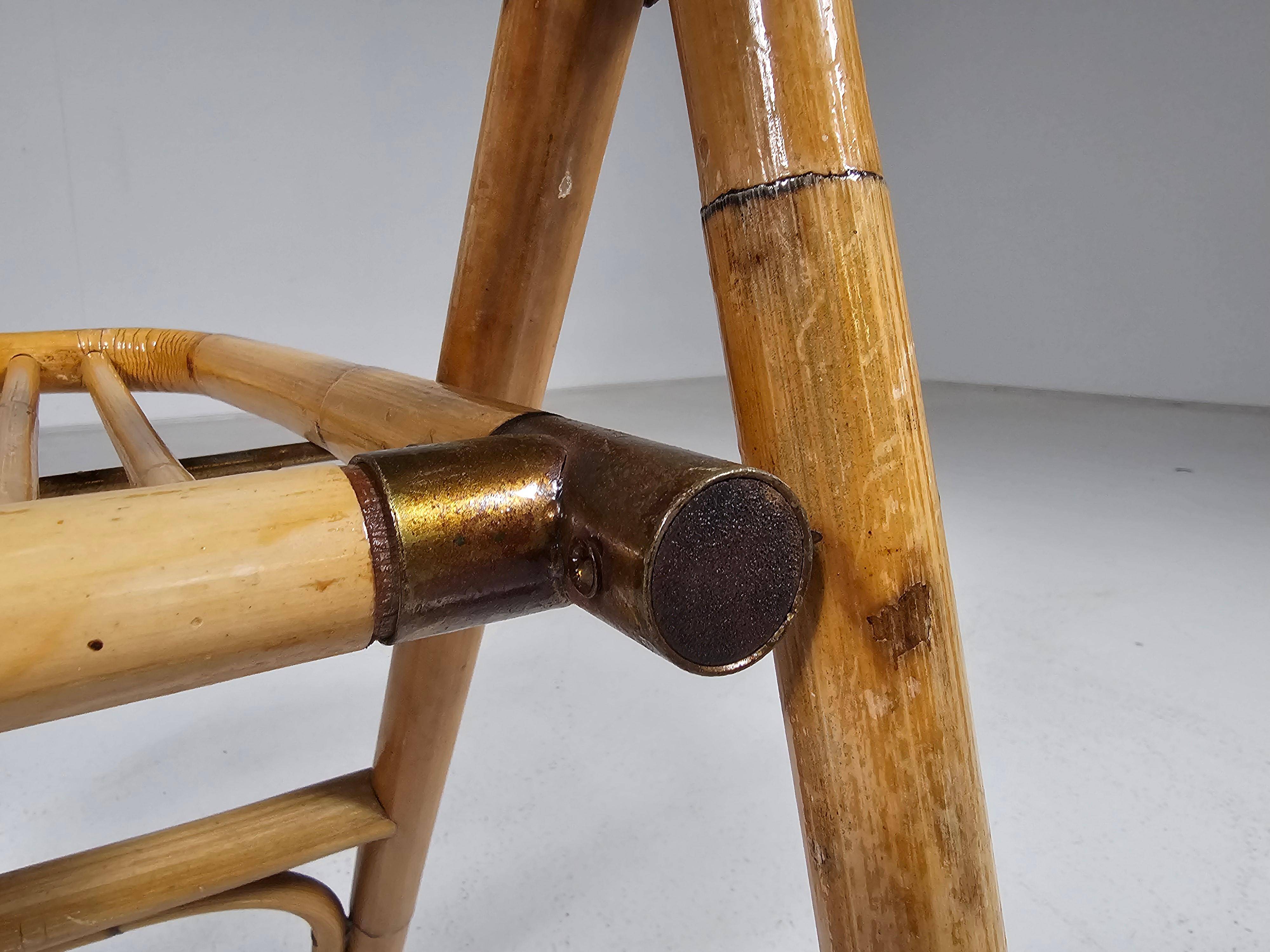 Set of 4 Dal Vera bamboo folding chairs, brass details, Italy, 1960s.