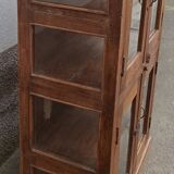 Old wooden display cabinet with three glazed sides