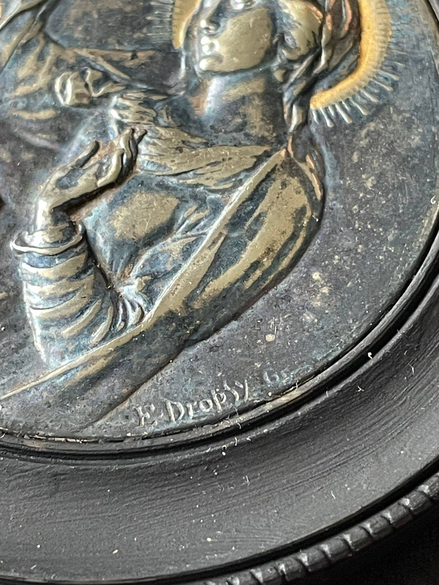 Medallion of the Virgin and Child signed Dropsy