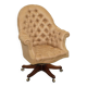 Chesterfield armchair in hardwood, leather, and woven linen.
