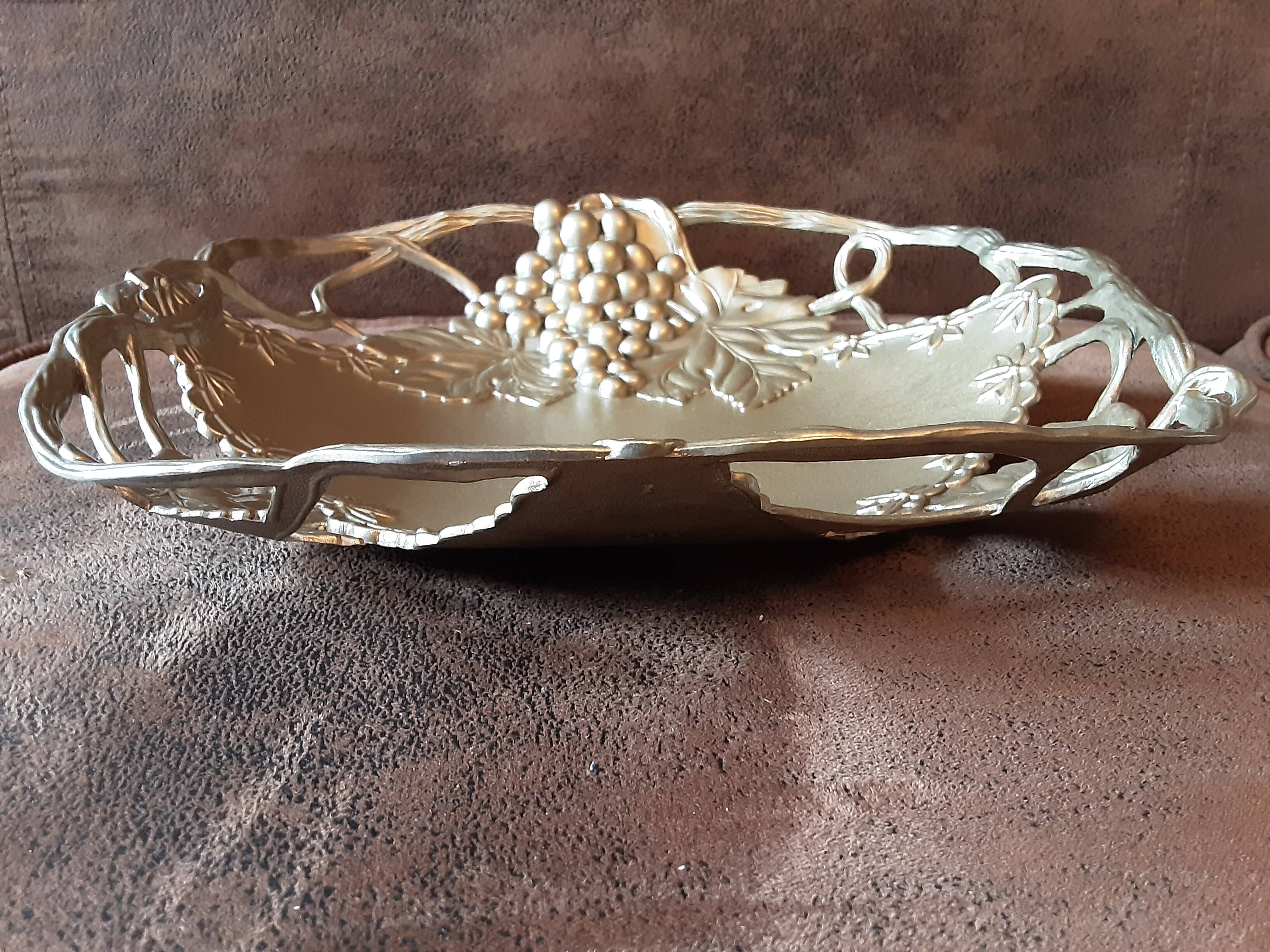 Metal basket with vine decor