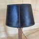 Copper lamp, fabric cable, sewn lampshade and leather.