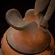 Carved alabaster urn lamp with stylized fish handle