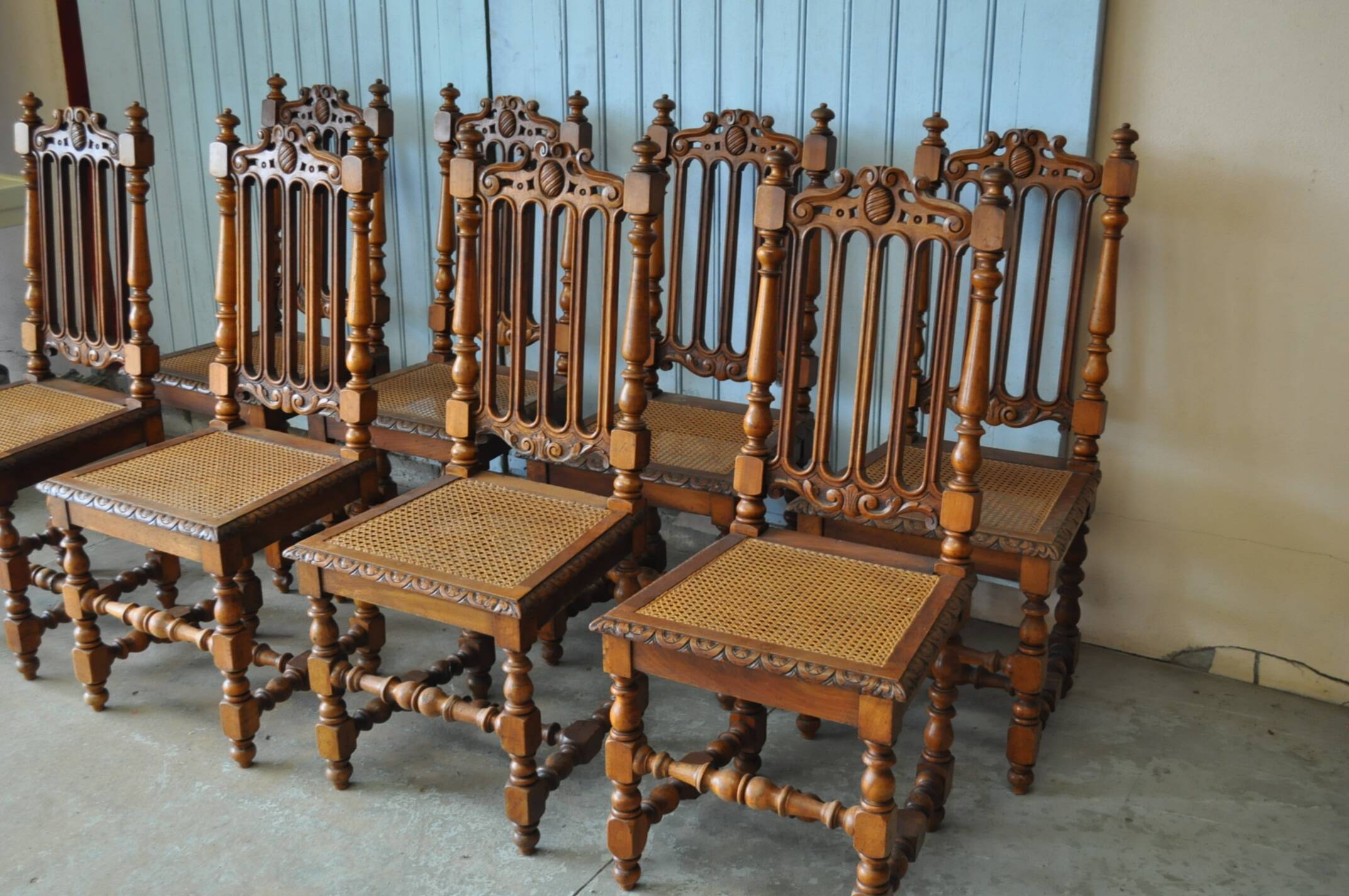 Set of 8 tanned chairs.