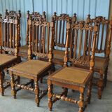 Set of 8 tanned chairs.