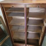 Double curtain binder in blond mahogany
