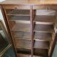 Double curtain binder in blond mahogany