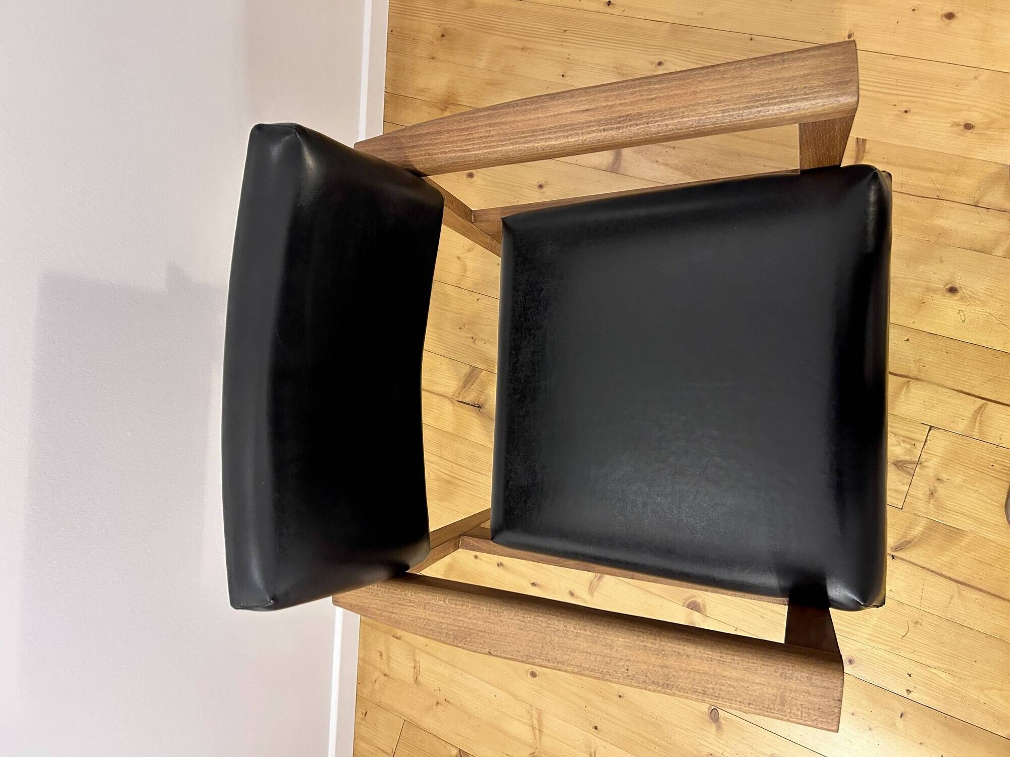 Mid-Century faux leather and wood armchair