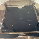 Vintage coffee table from the 80s in smoked glass and chrome metal